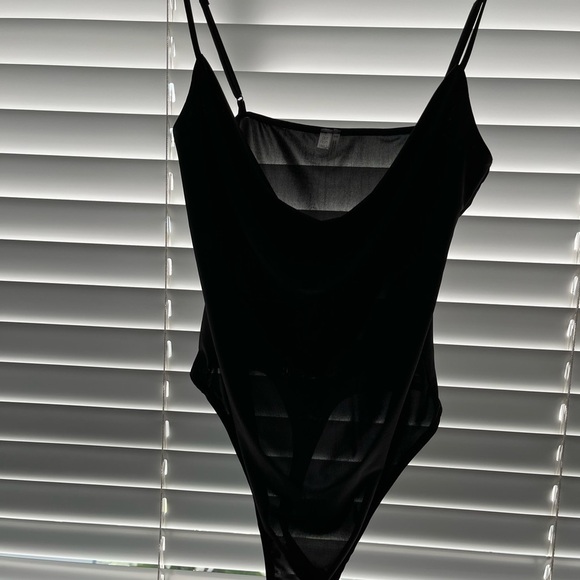 Out From Under Bodysuit: Black Solid
Tops - Size Medium with thong bodysuit. - Picture 1 of 7